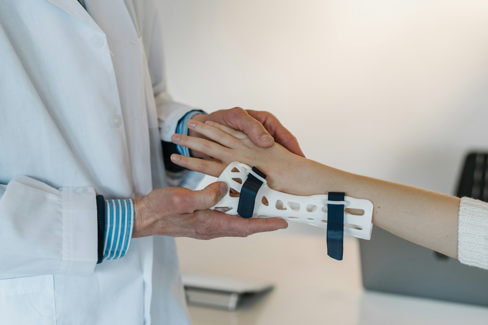 A wrist support being fitted during rehabilitation